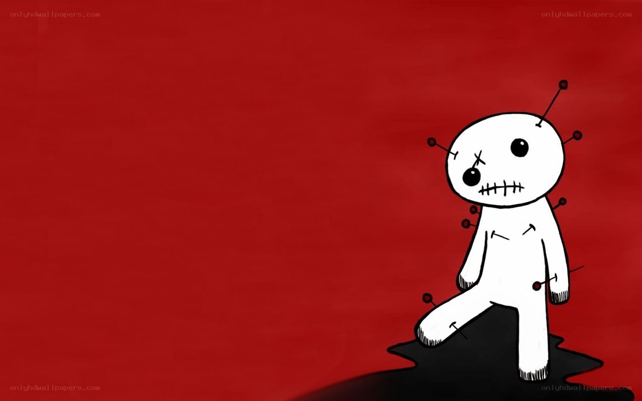 voodoo doll on red background