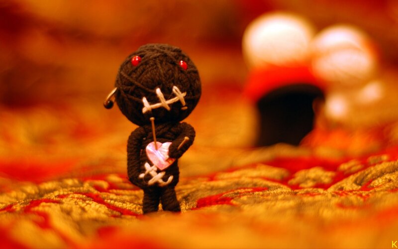 Voodoo doll with heart