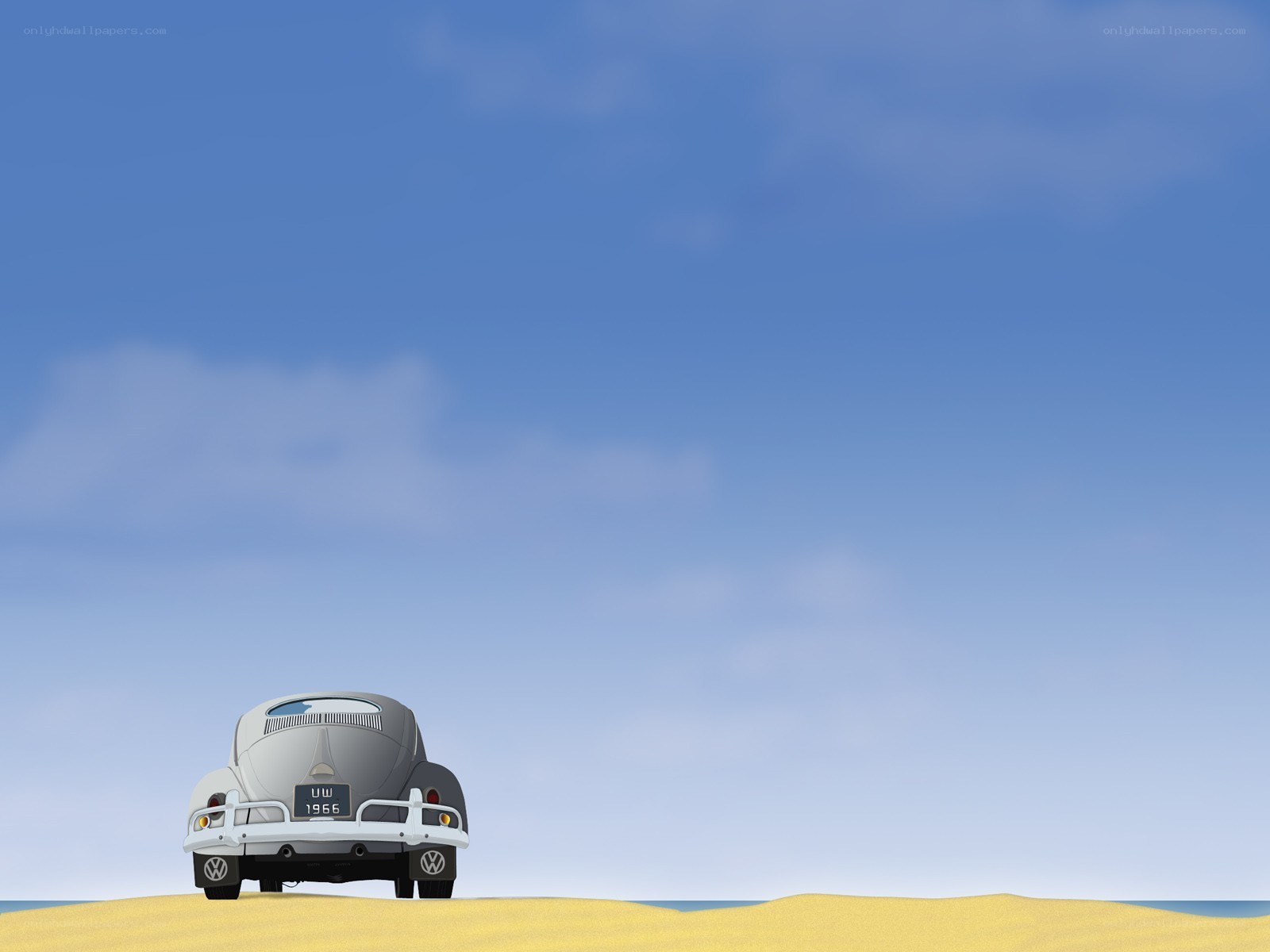 VW Beetle on a sandy beach