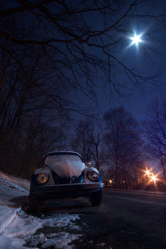 VW Beetle under moonlight