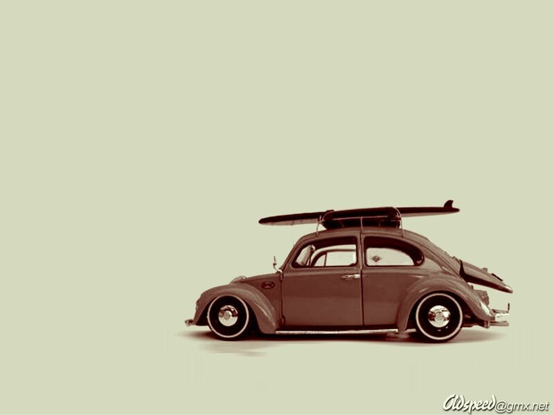 VW Beetle with surfboard