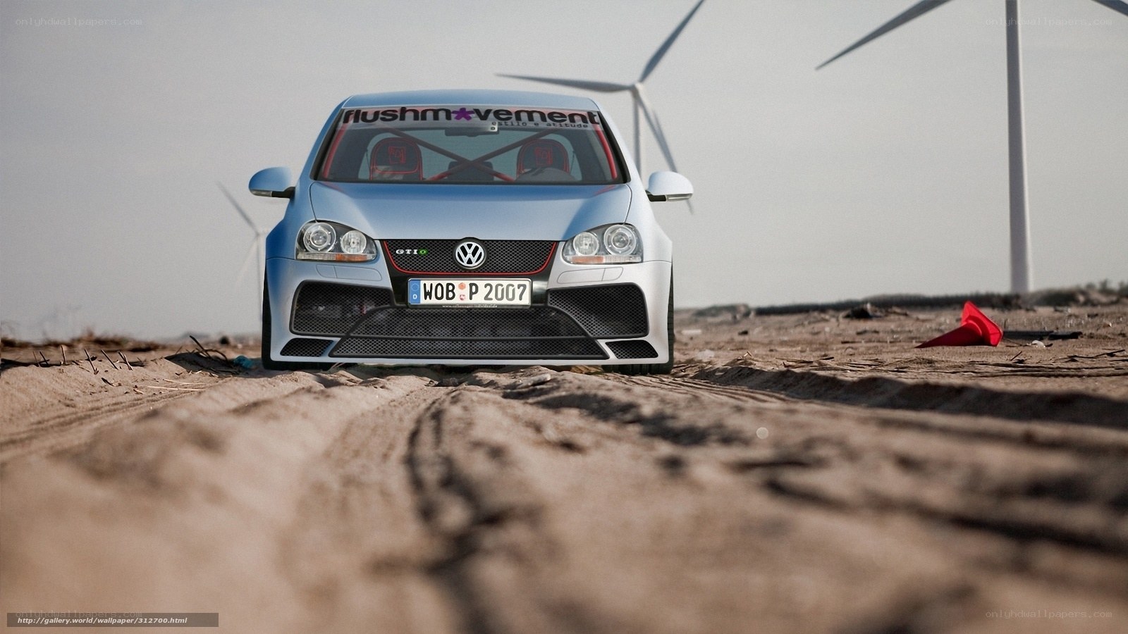 VW GTI on sandy terrain