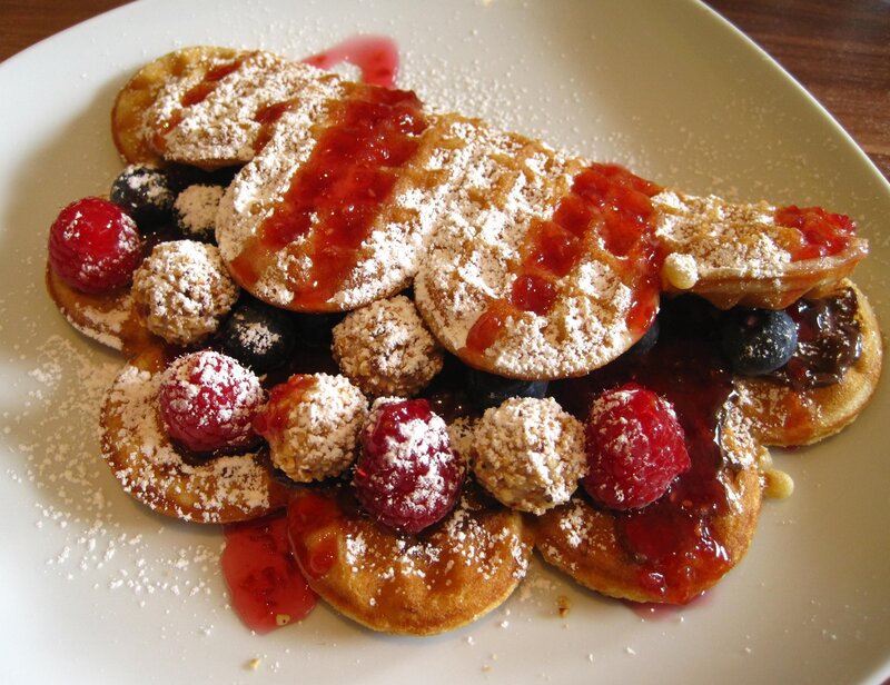 Waffles with berries and jam