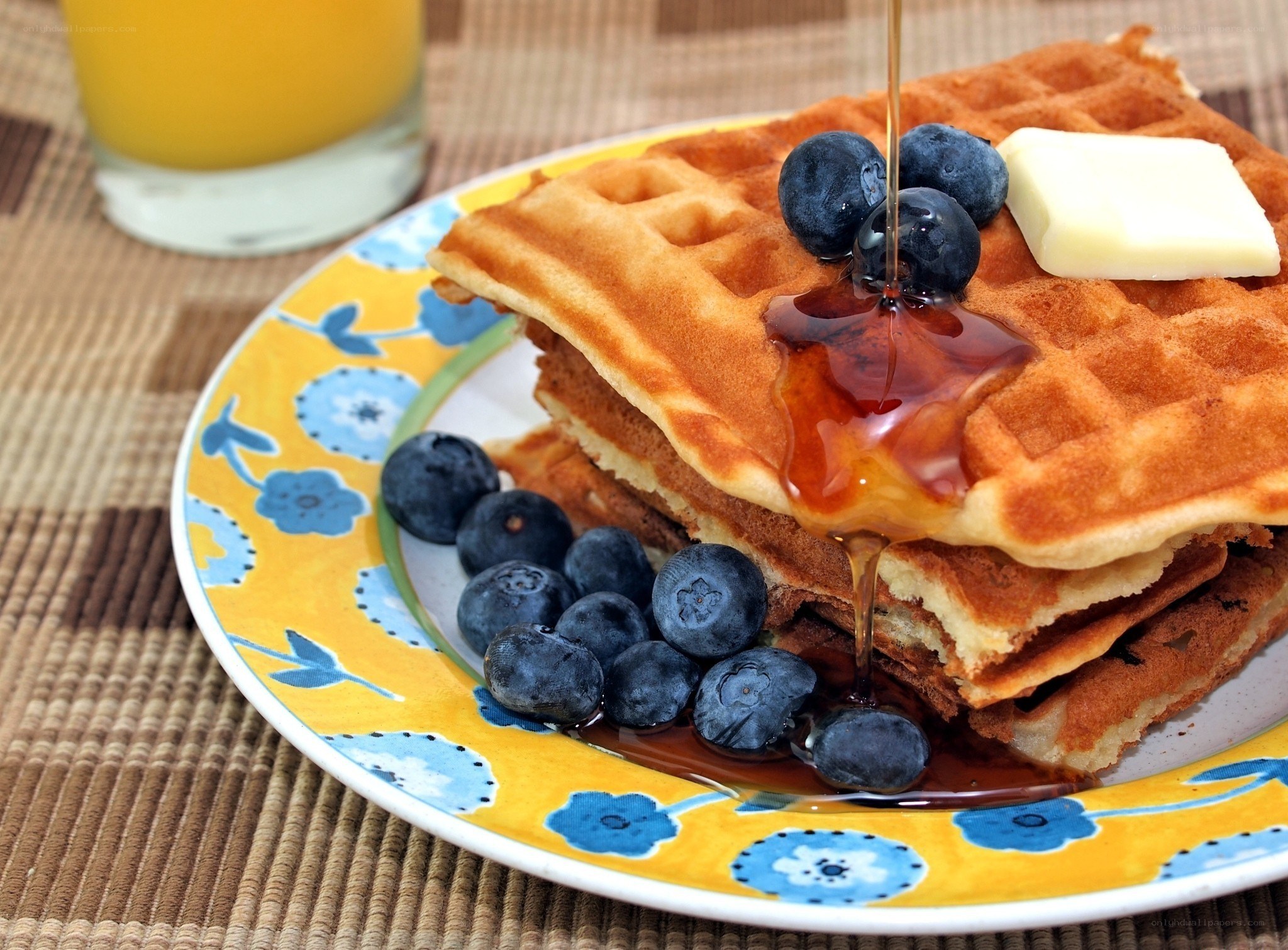 Waffles with blueberries and syrup