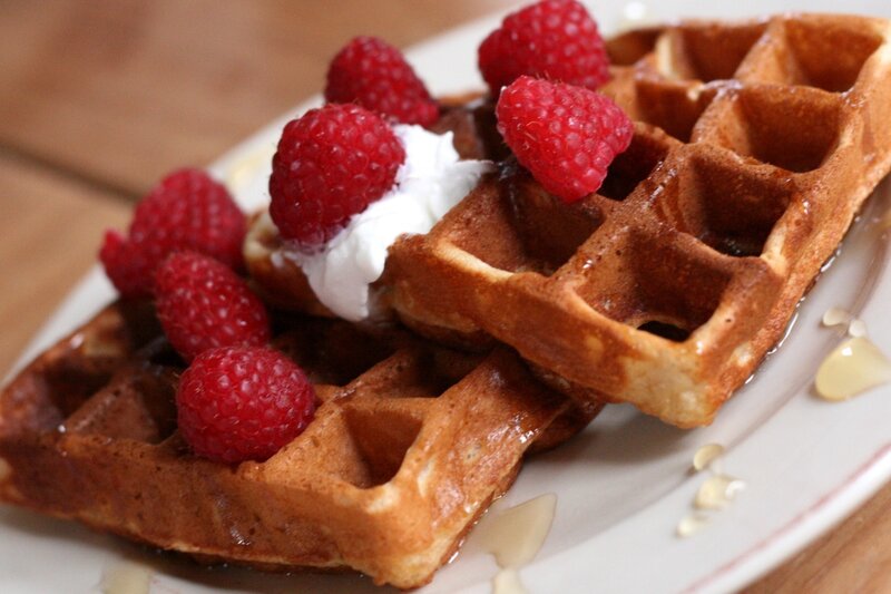 Waffles with raspberries and cream