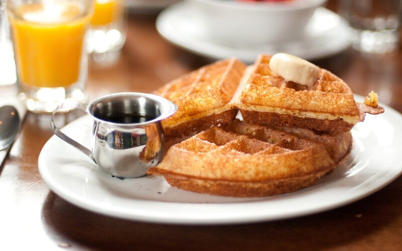 waffles with syrup and orange juice