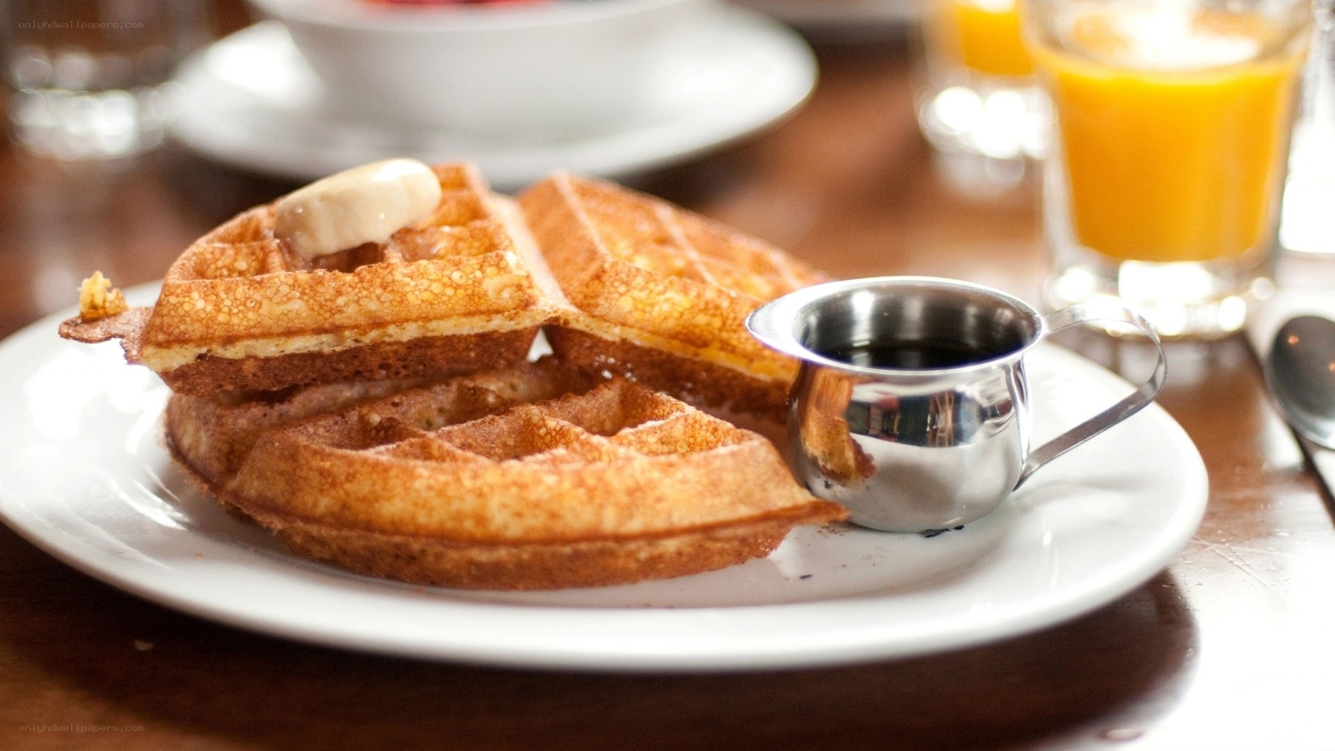 waffles with syrup and orange juice