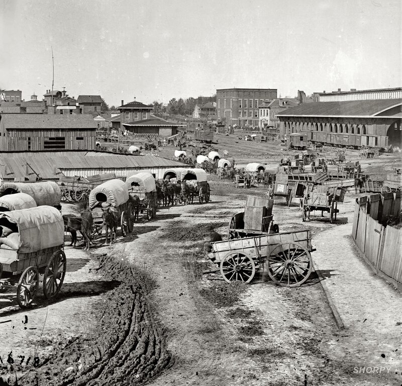 Wagon train at a frontier town