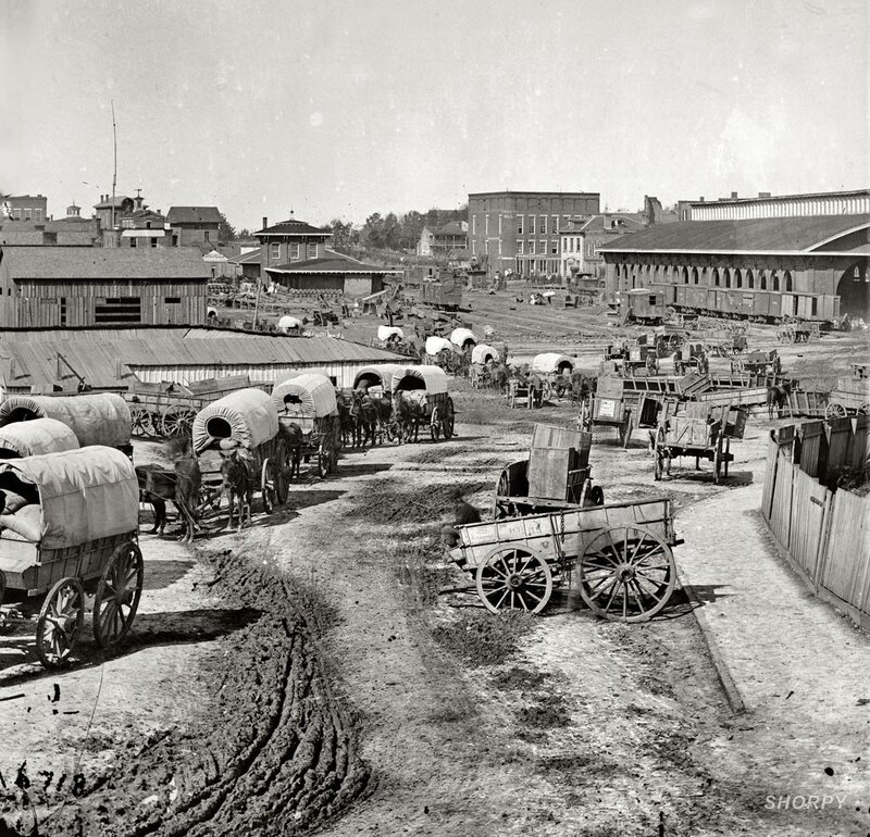 Wagon train in a frontier town
