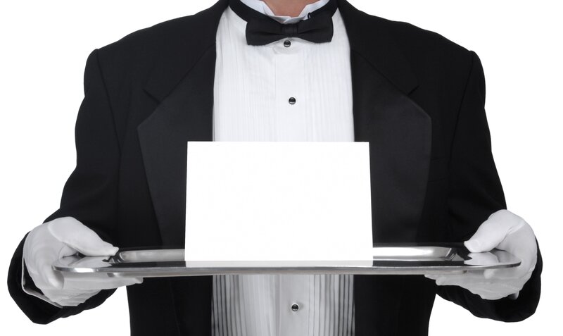 waiter holding tray