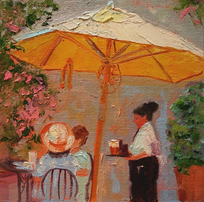 Waiter serving at outdoor cafe