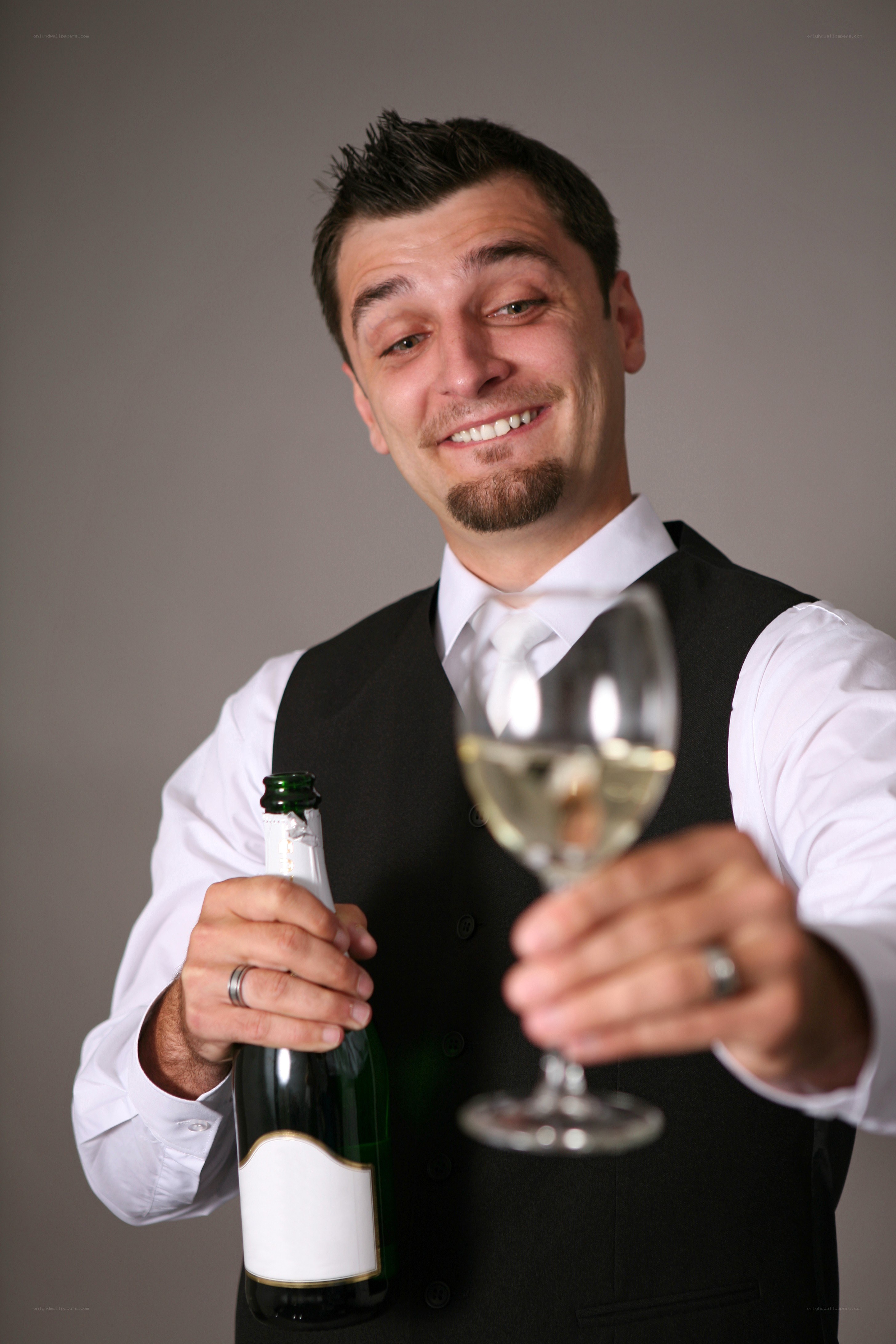 Waiter with champagne bottle