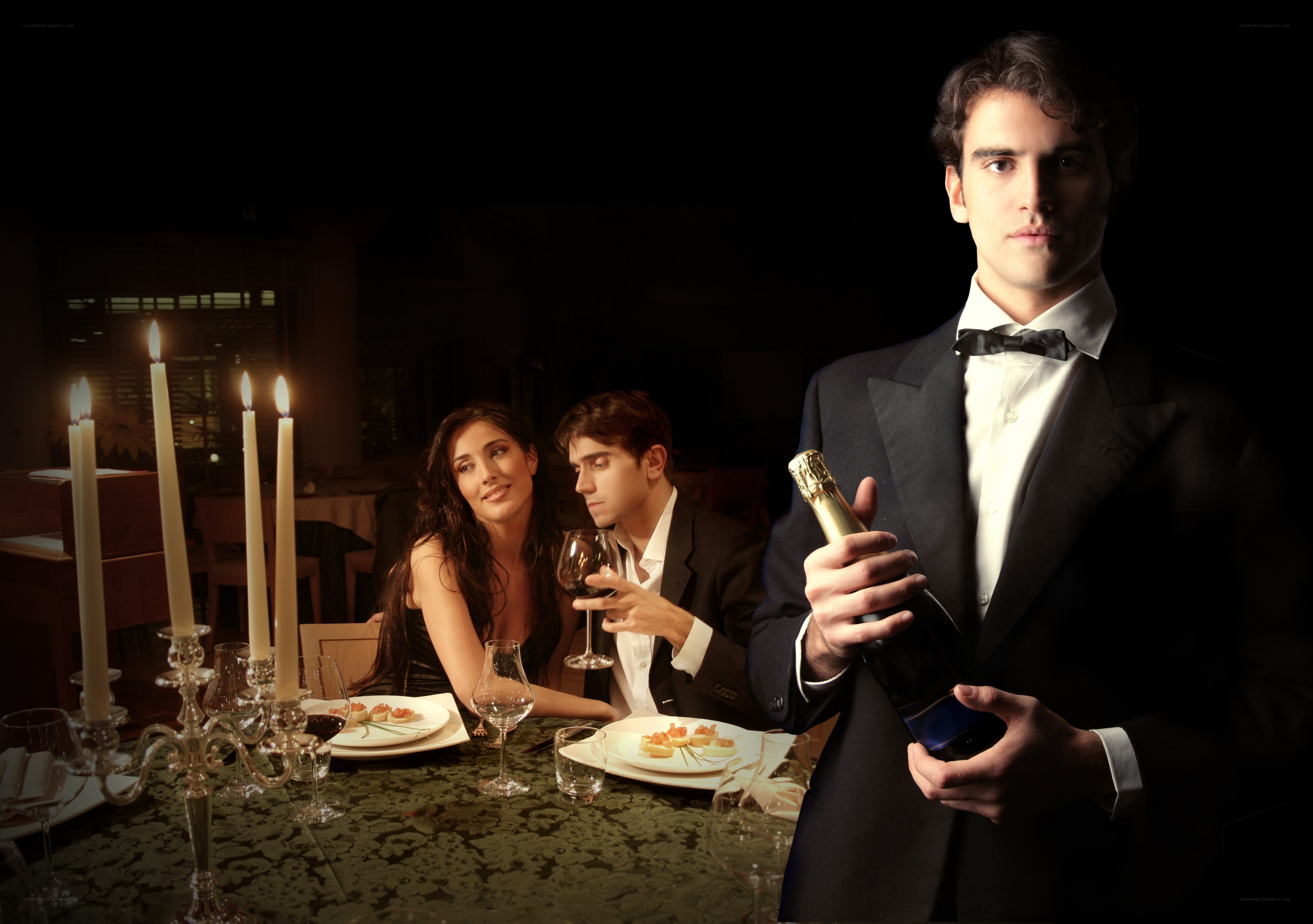 Waiter with champagne bottle