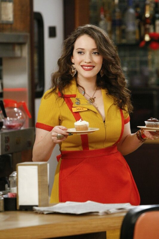 Waitress holding cupcakes