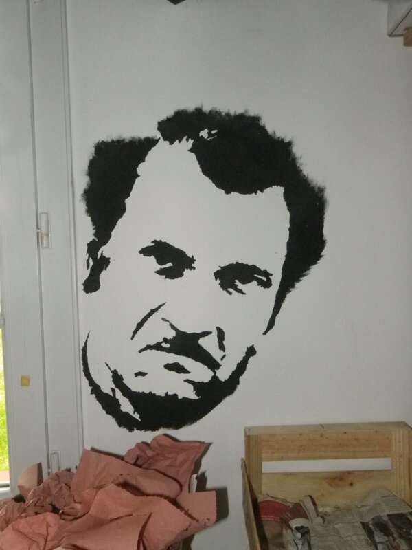 wall art of a man's face