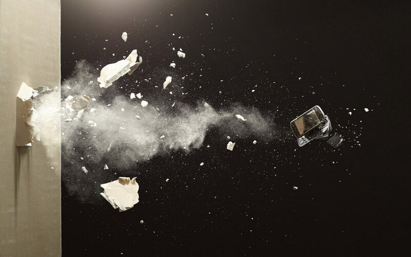 Wall breaking with debris