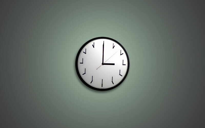 wall clock with arrows