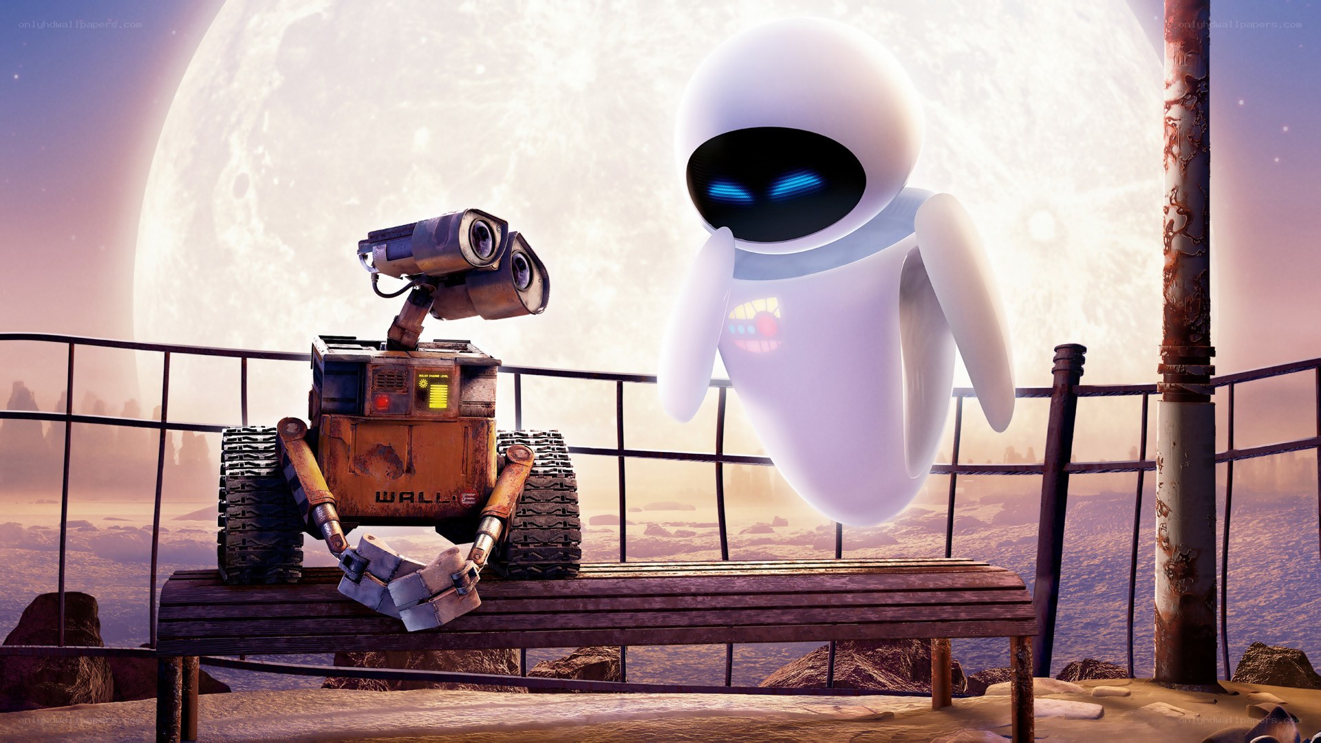 Wall-E and Eve on a bench