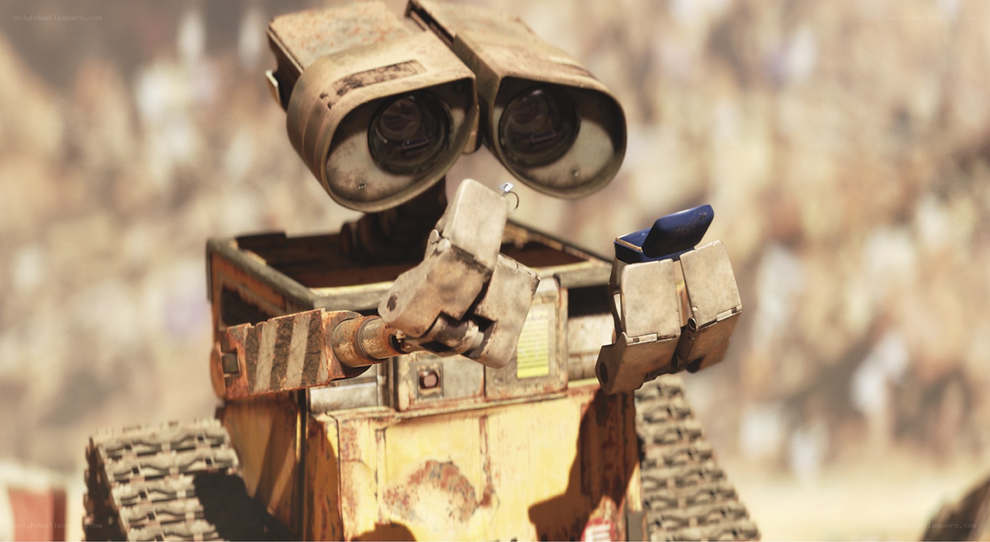 Wall-E holding a gift
