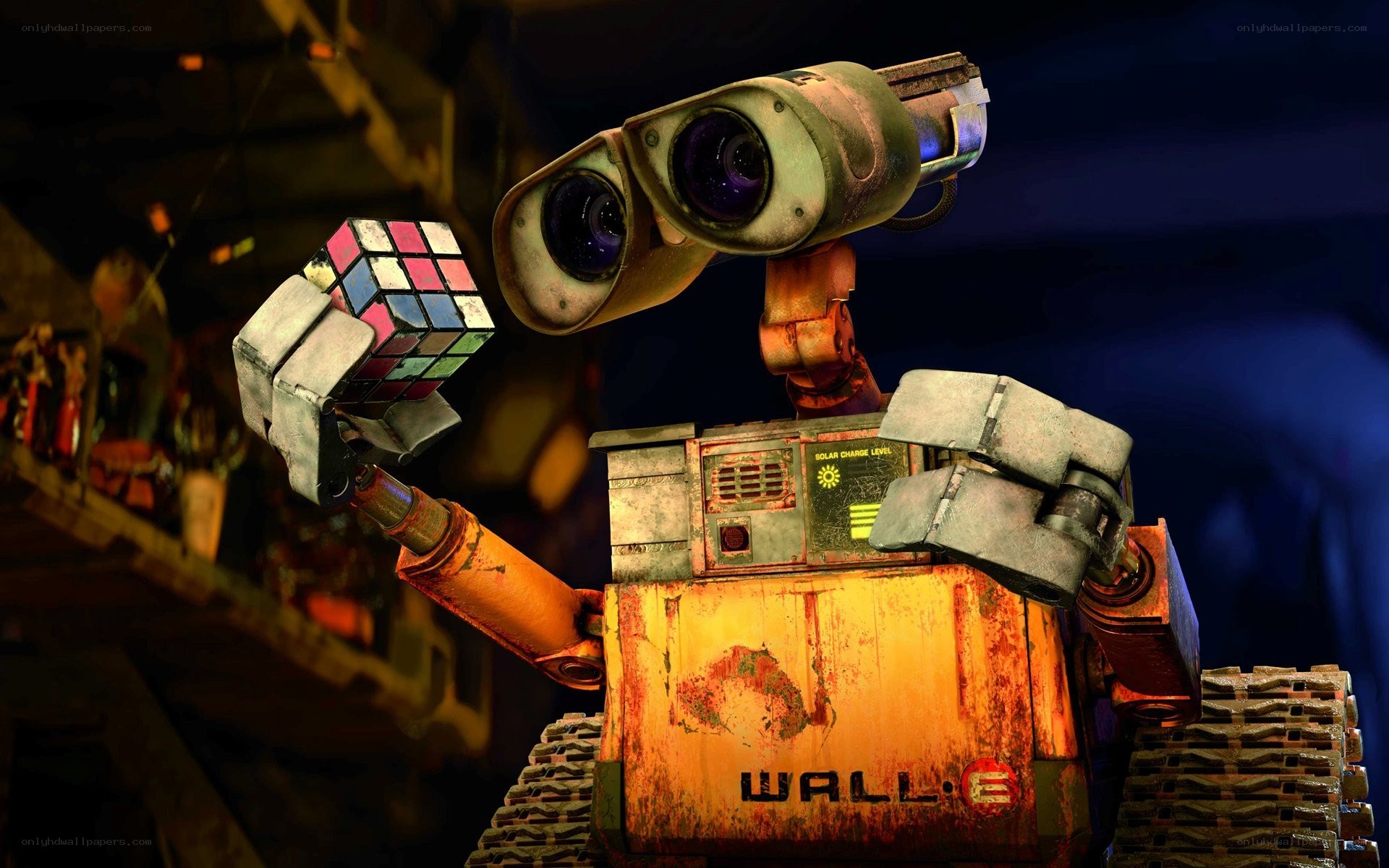 Wall-E holding a Rubik's cube