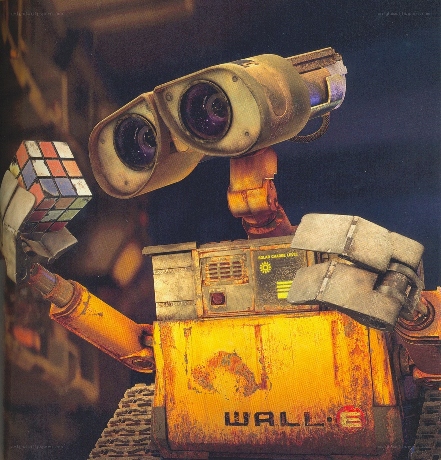 Wall-E holding a Rubik's Cube
