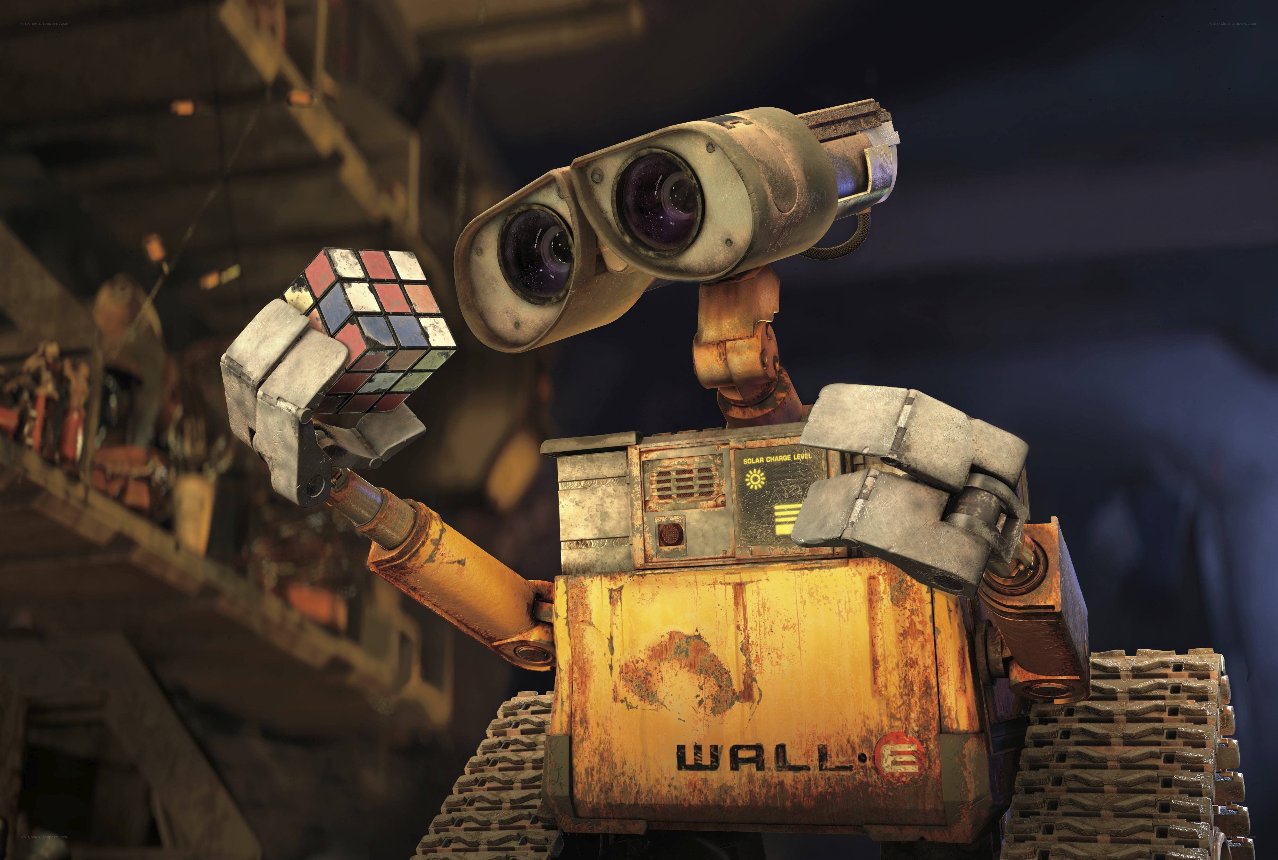 Wall-E holding a Rubik's Cube