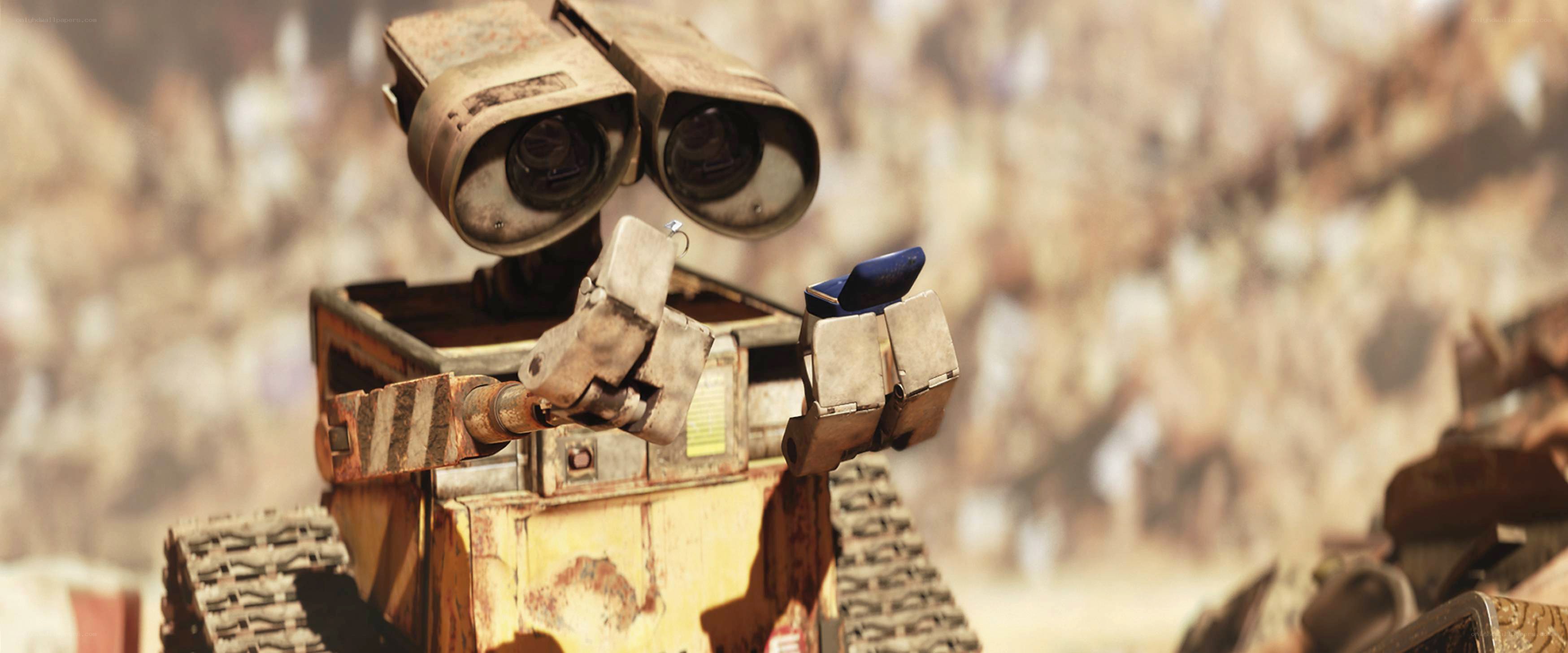 Wall-E robot holding a gift