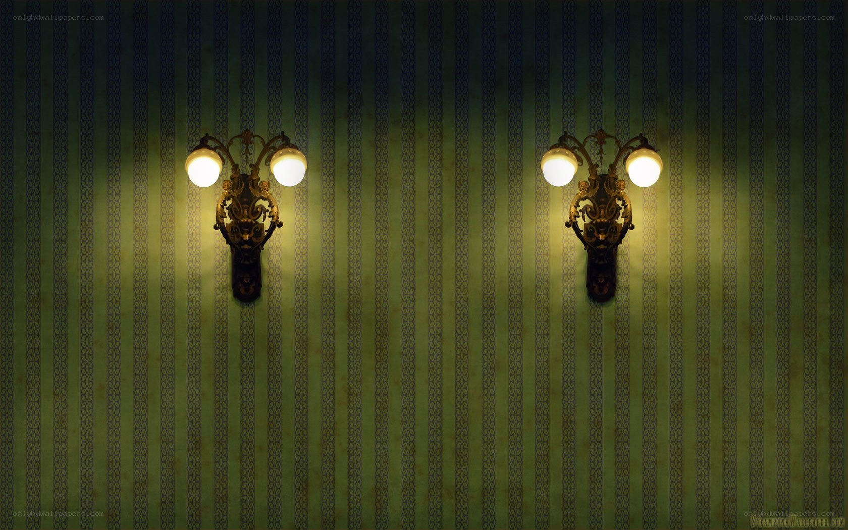 Wall sconces on striped wallpaper