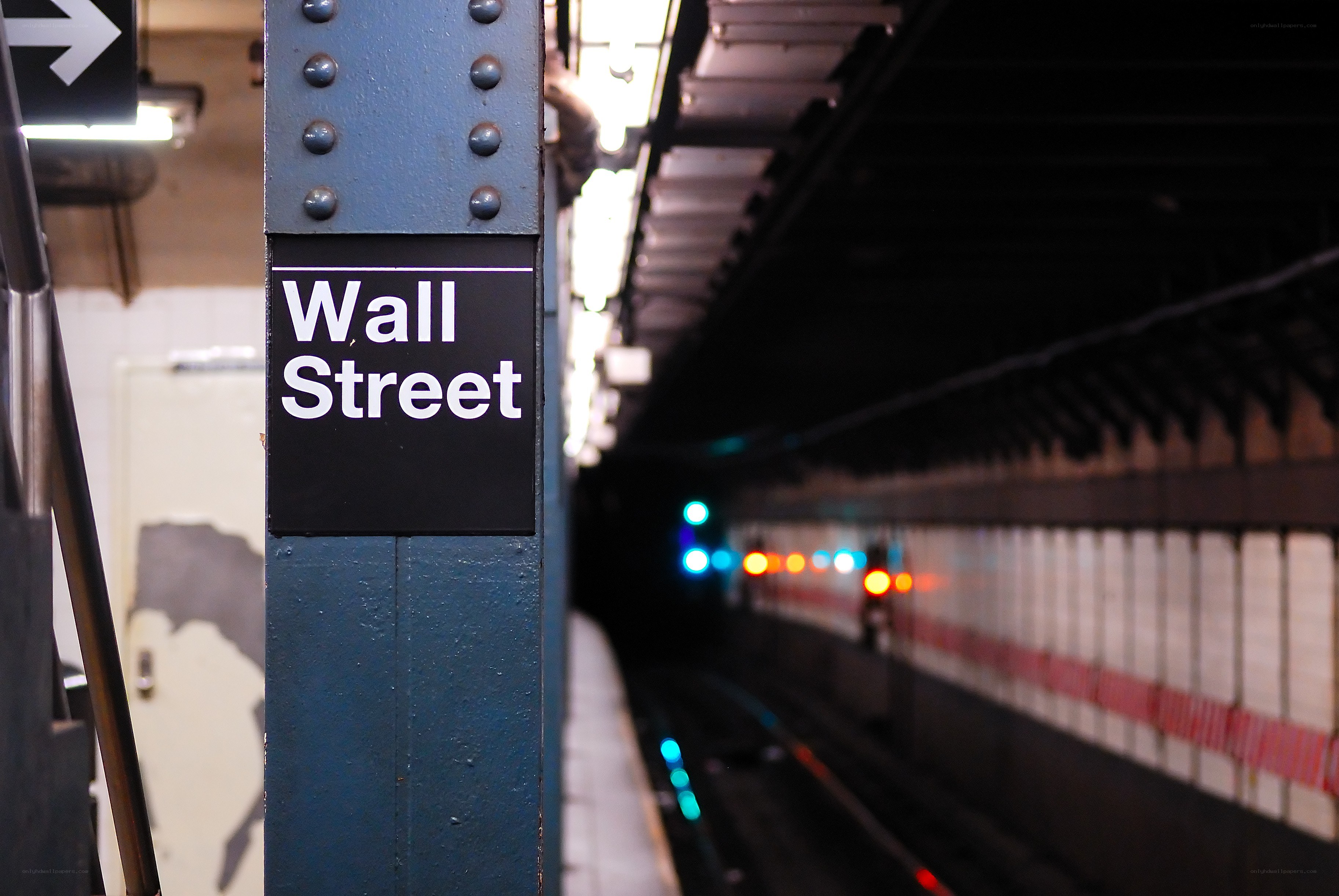 Wall Street subway station sign