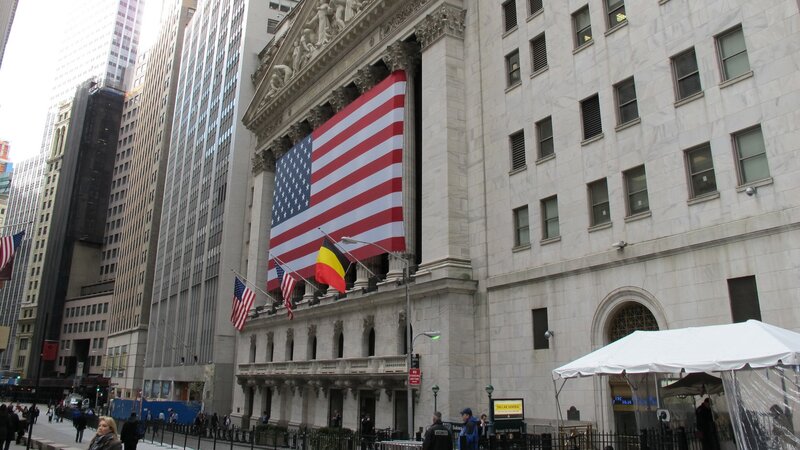 Wall Street with American flag
