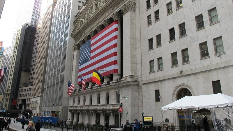 Wall Street with American flag