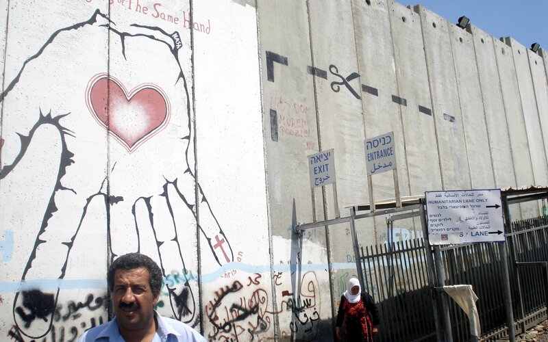 Wall with graffiti and checkpoint