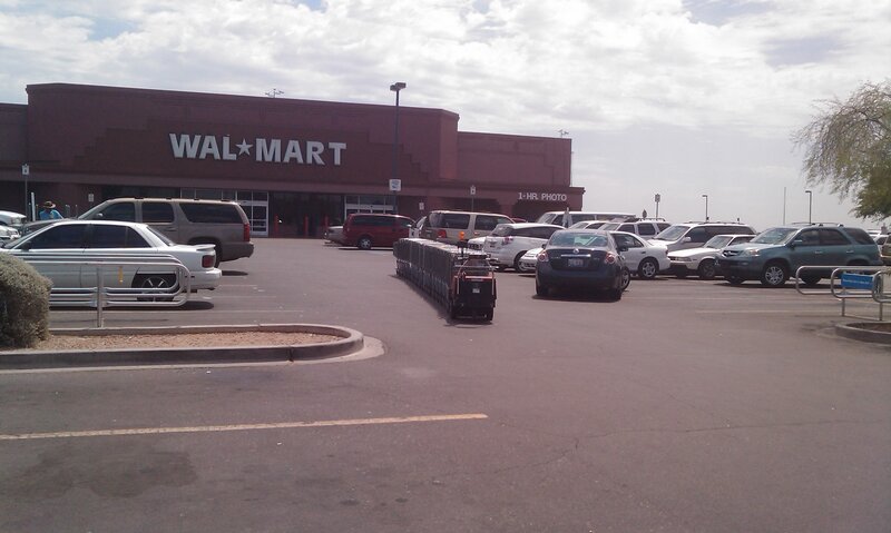 Walmart parking lot with cars