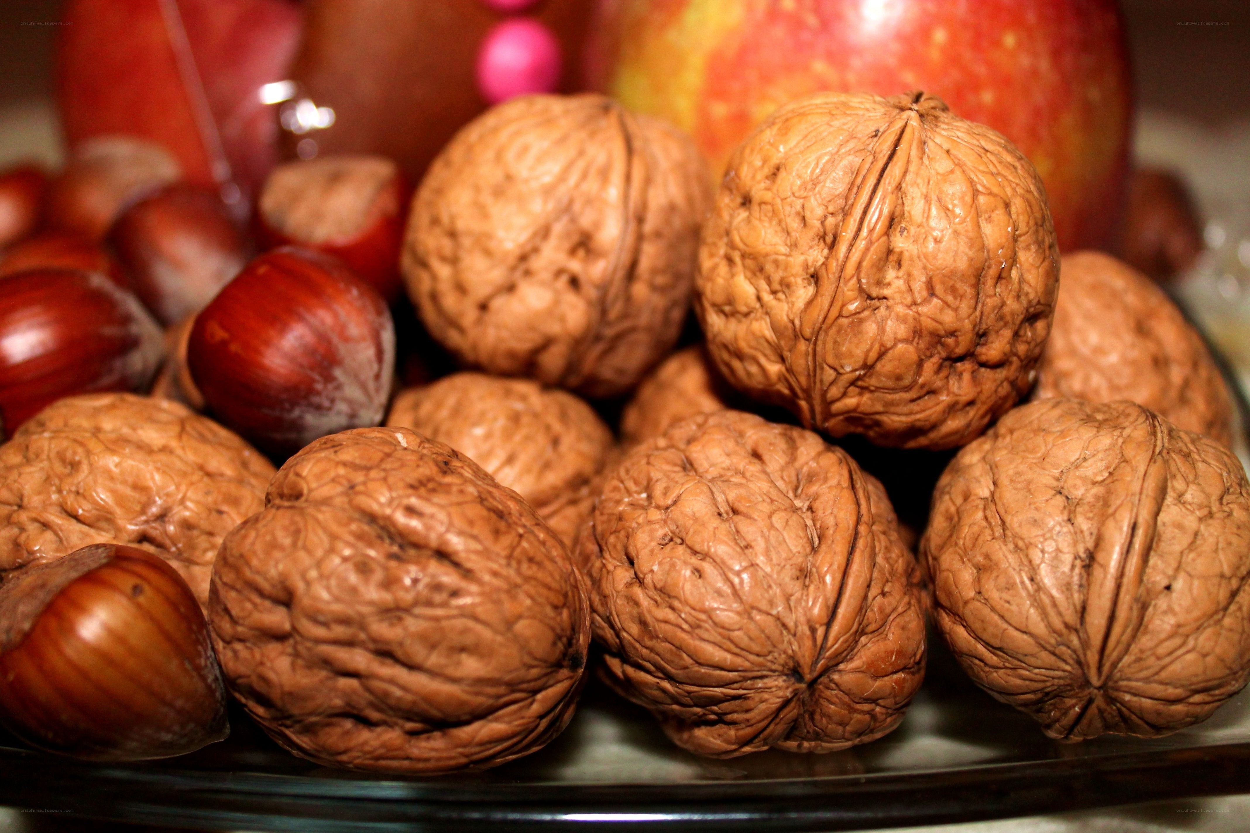 walnuts and chestnuts on a plate