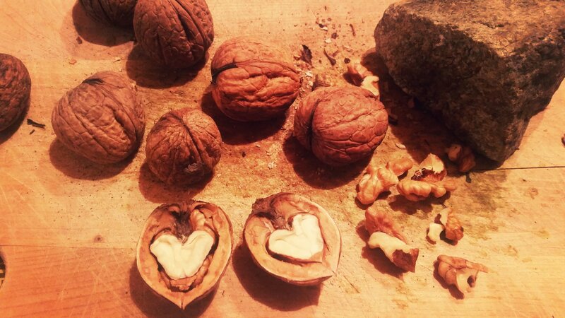 walnuts on a wooden surface