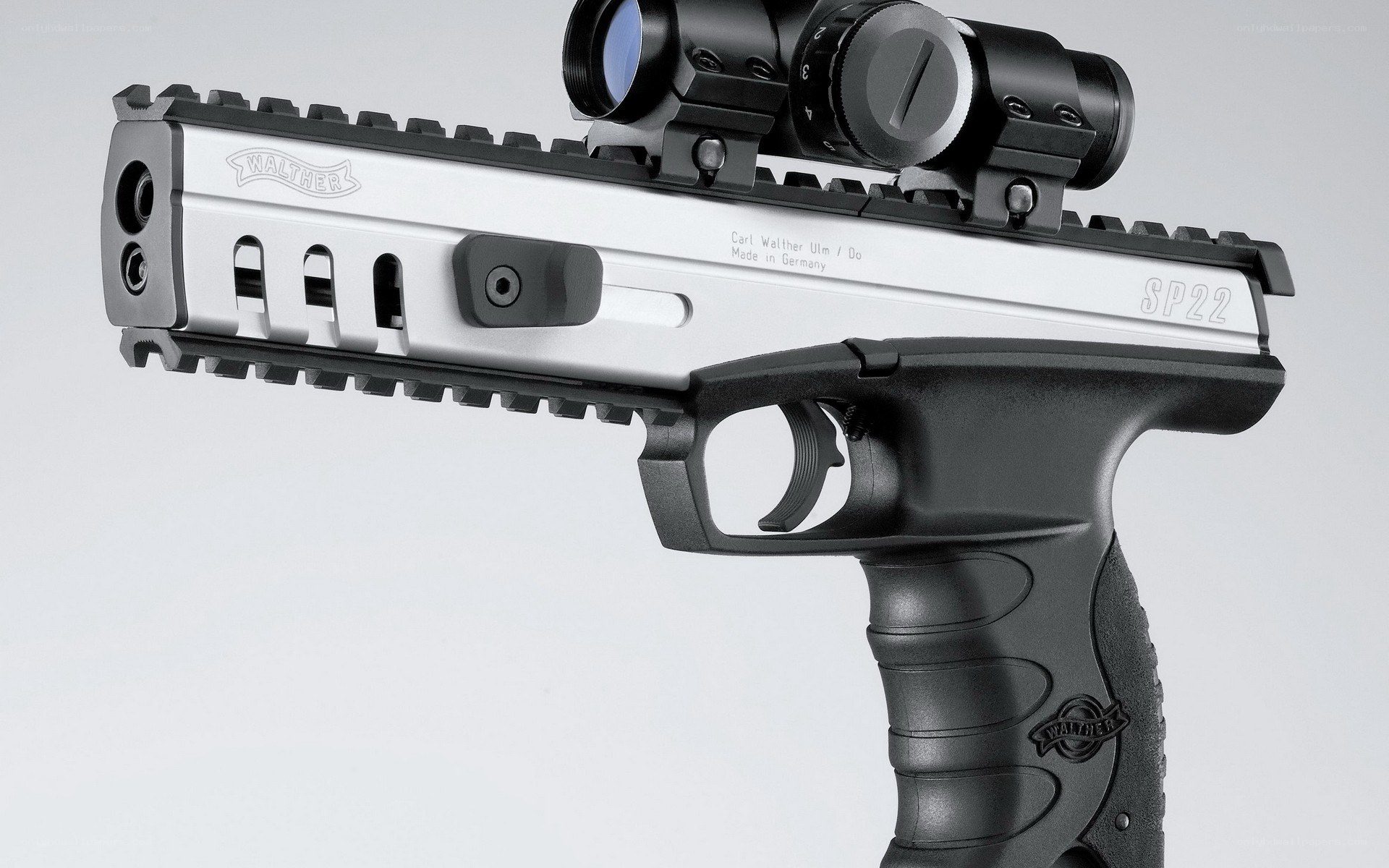 Walther SP22 pistol with scope