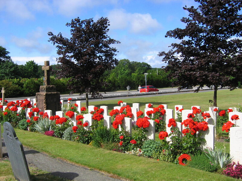 War graves with red flowers