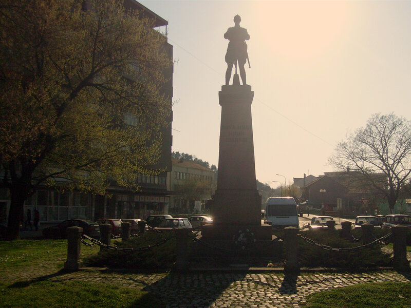 war memorial statue at sunset