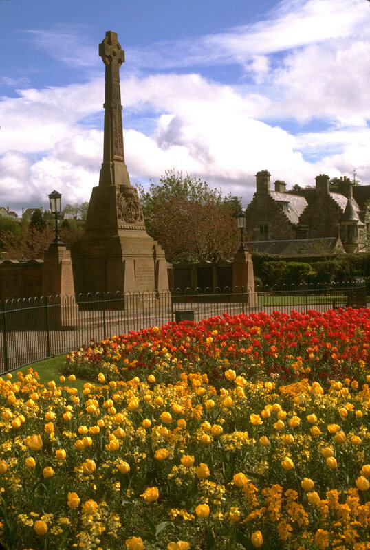 War memorial with tulips