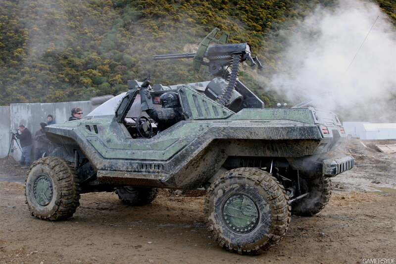 War vehicle firing in mud