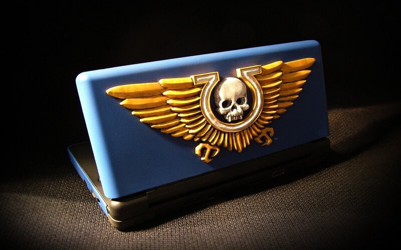 Warhammer 40k logo on blue console