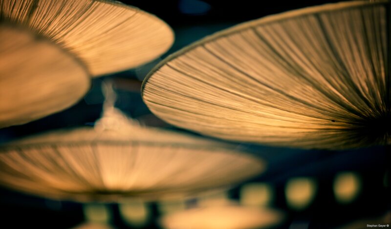 Warm lanterns in dim light