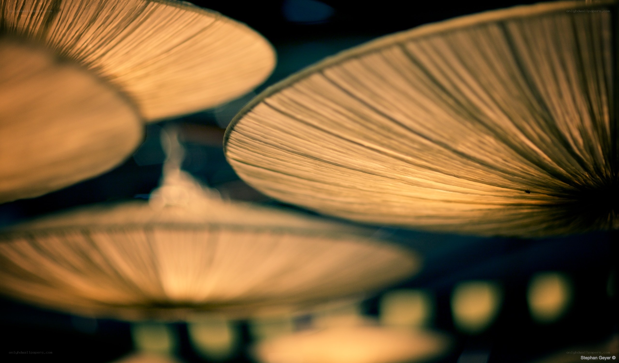 Warm lanterns in dim light