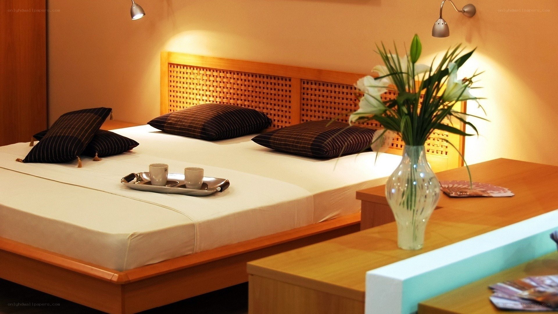 Warmly lit bedroom with flowers