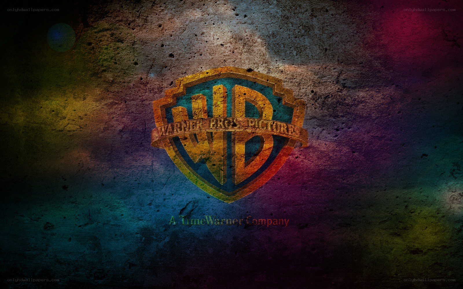 Warner Bros logo on textured wall
