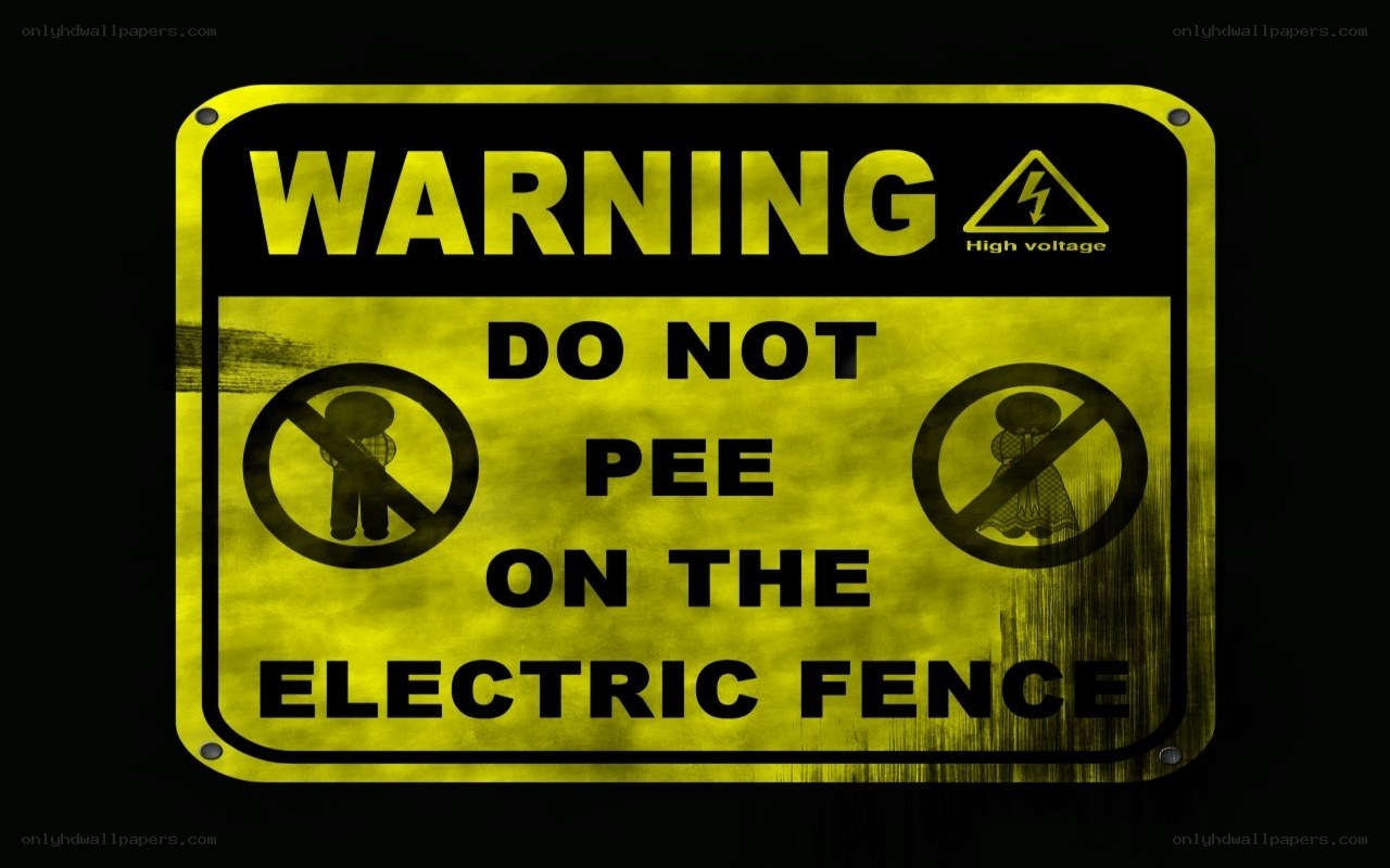 Warning sign on electric fence