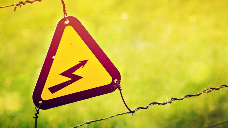 Warning Sign on Fence — Yellow, Cautious, Afternoon