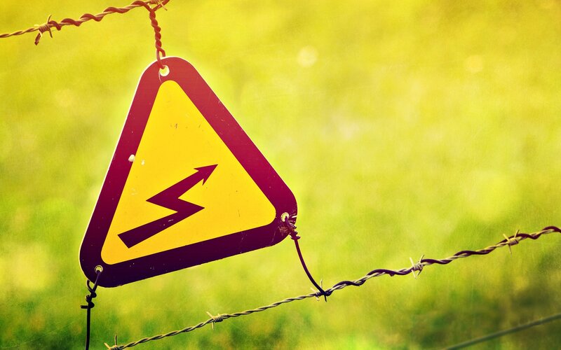 Warning Sign on Fence — Yellow, Cautious