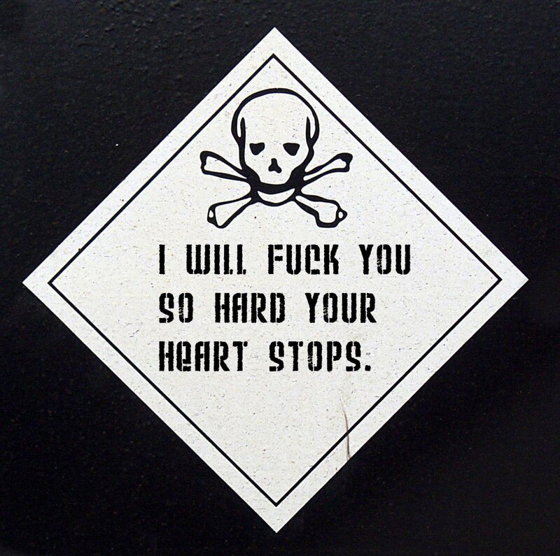 warning sign with explicit text