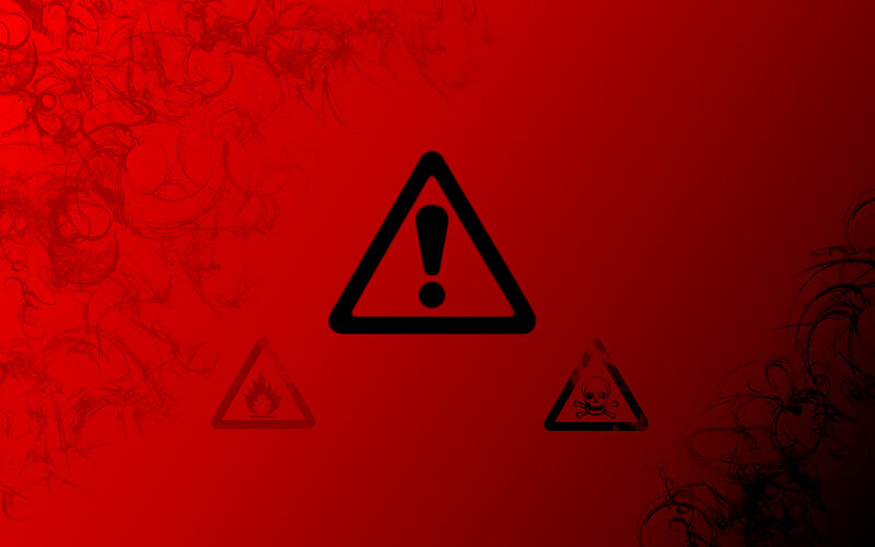 warning signs on red background